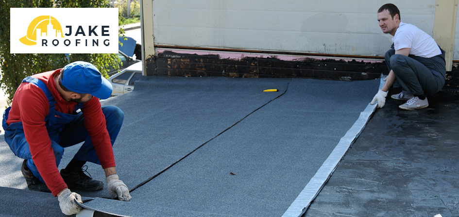 Roof Patching Installation Workers installing roof patch on pitched roof